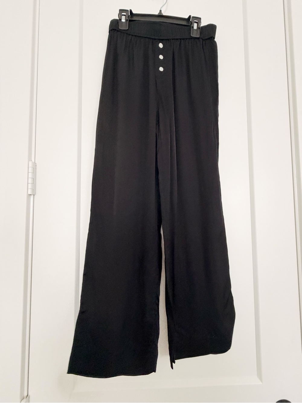 Anthropologie black satin pants